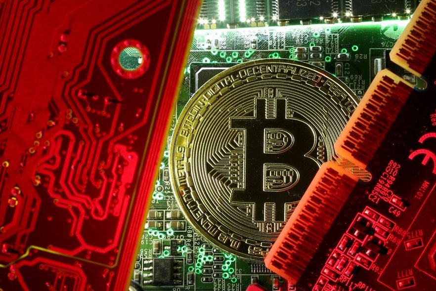 Bitkoinų perspektyvos: pagrindiniai valdytojai gali per akimirką „nusitempti viską į apačią“ (nuotr. SCANPIX)