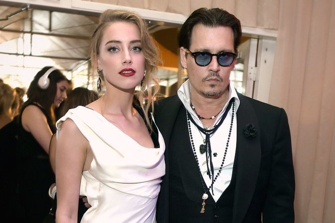 Johnny Deppas ir Amber Heard (nuotr. SCANPIX)