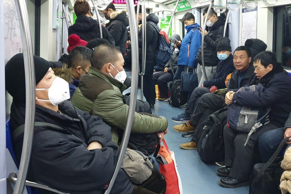 Kinijos virusas: 9 mln. gyventojų turintį miestą palieka be viešojo transporto (nuotr. SCANPIX)