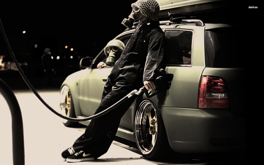 17447-filling-up-the-car-wearing-a-gas-mask-1920x1200-photography-wallpaper
